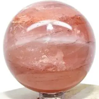 Heated Hematoid Quartz Sphere by Weight 558.4g